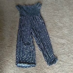 Showing shoulder pokadot jumpsuit